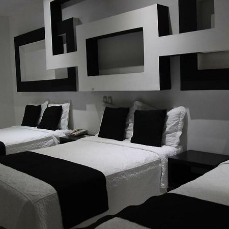 Hotel Dluxe ซานฮวน เด ลอสลากอส ภายนอก รูปภาพ