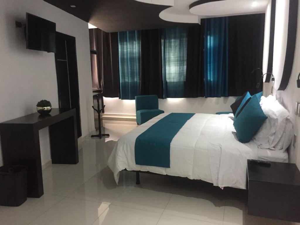 Hotel Dluxe ซานฮวน เด ลอสลากอส ภายนอก รูปภาพ