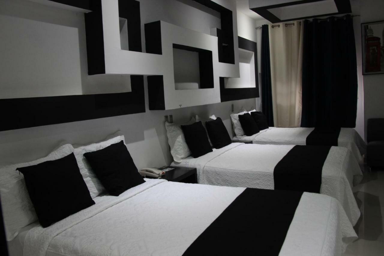 Hotel Dluxe ซานฮวน เด ลอสลากอส ภายนอก รูปภาพ
