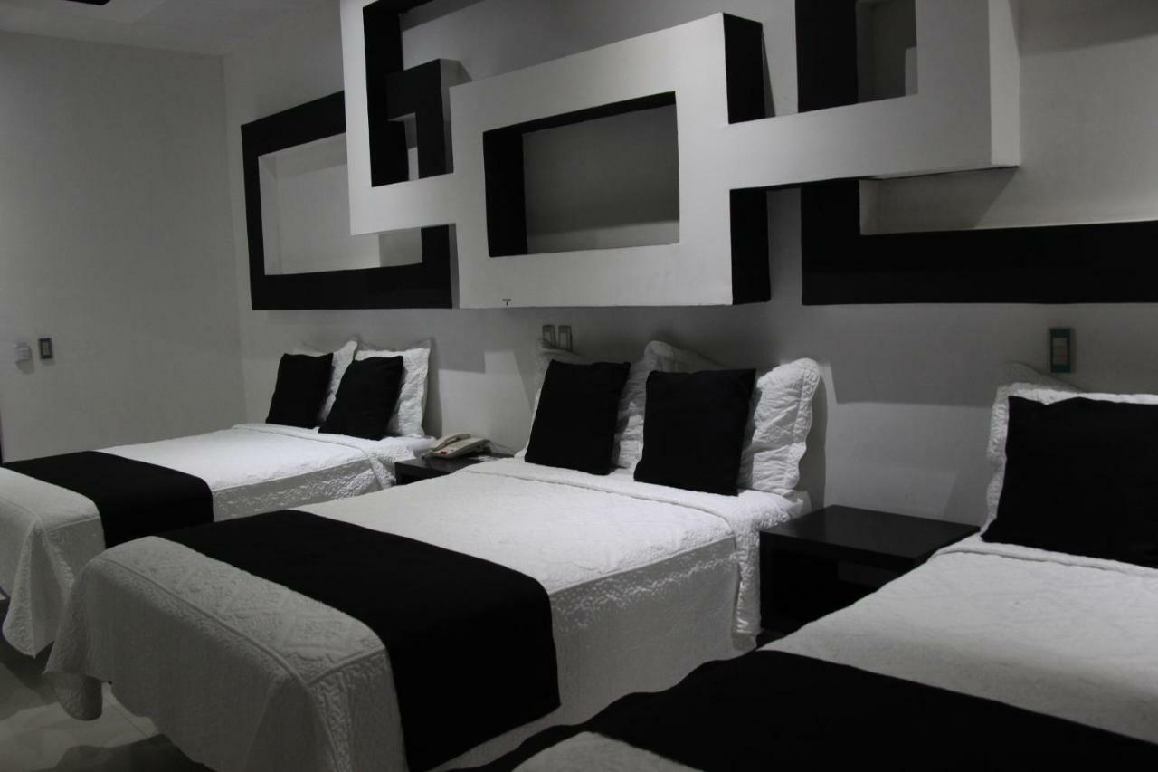 Hotel Dluxe ซานฮวน เด ลอสลากอส ภายนอก รูปภาพ