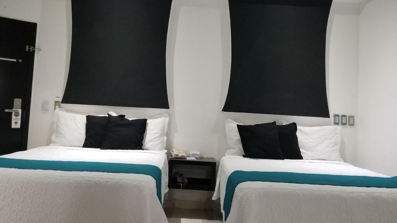 Hotel Dluxe ซานฮวน เด ลอสลากอส ภายนอก รูปภาพ
