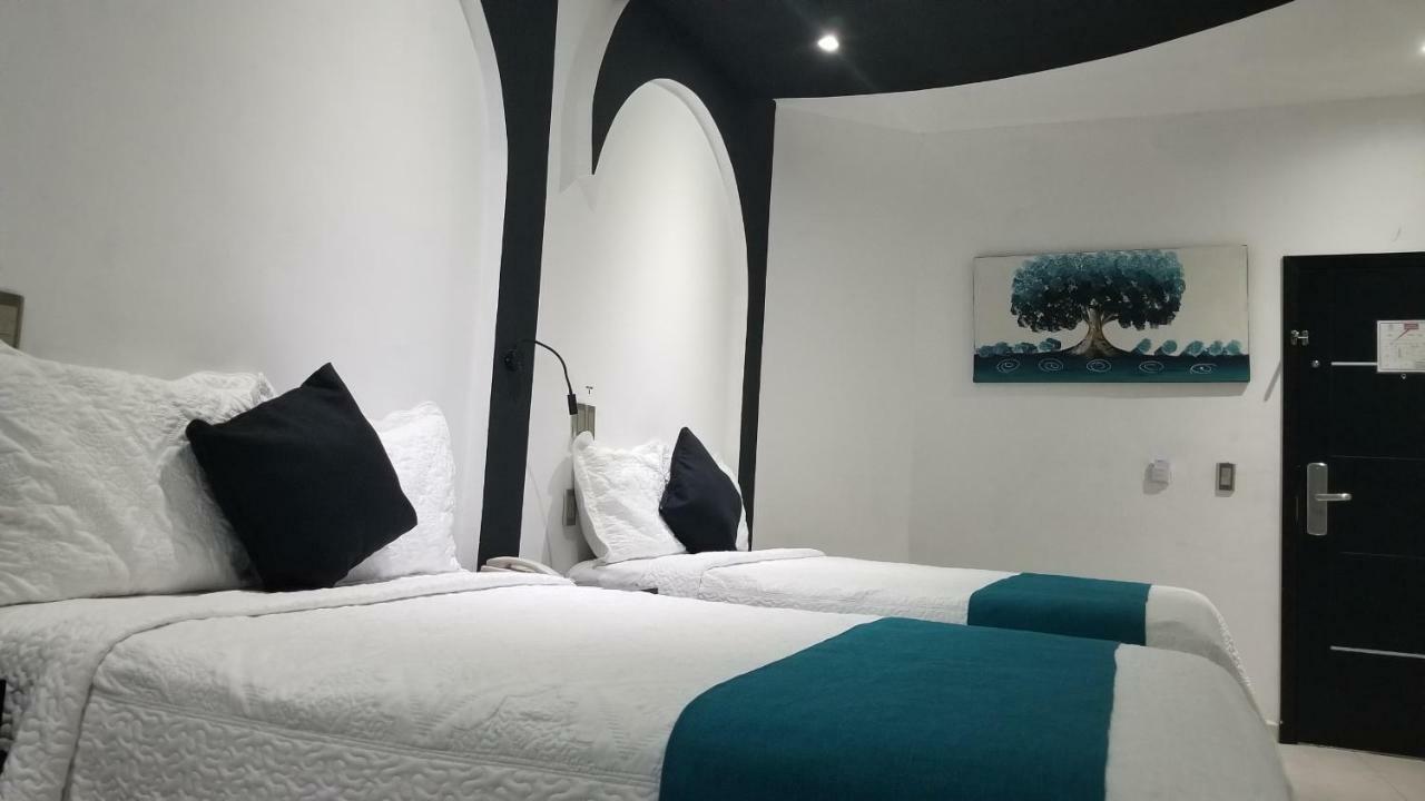 Hotel Dluxe ซานฮวน เด ลอสลากอส ภายนอก รูปภาพ