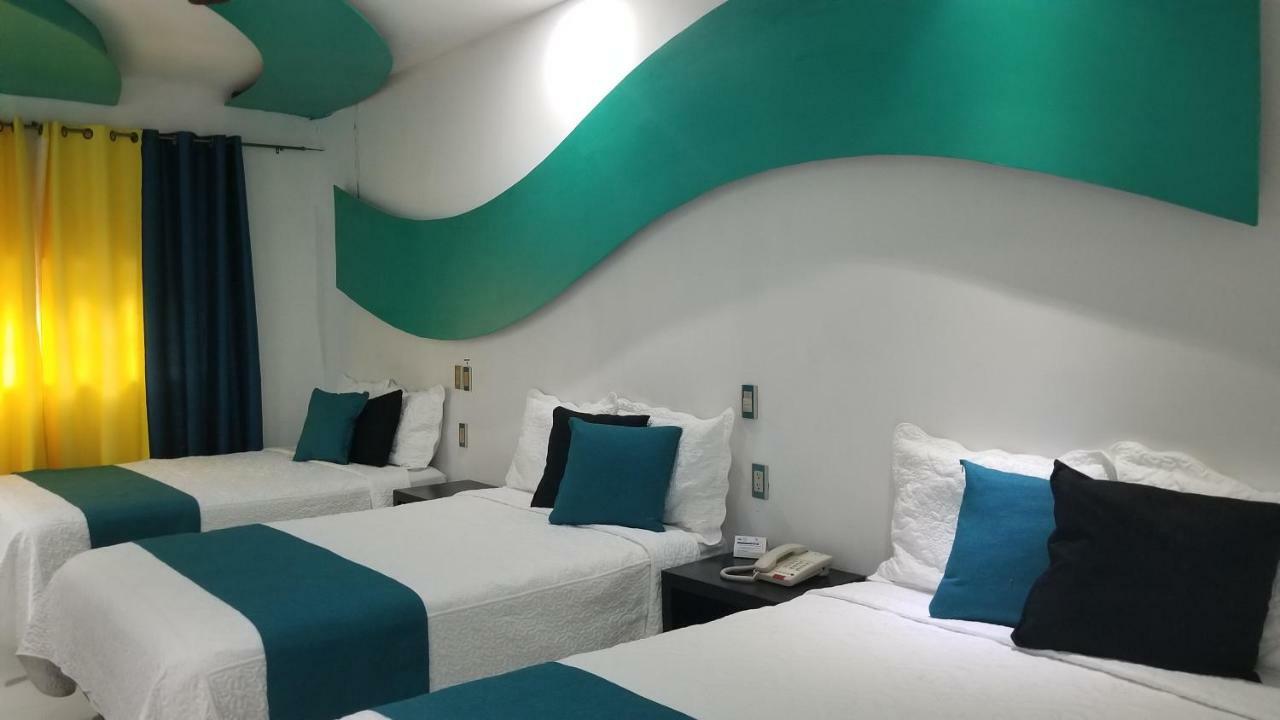Hotel Dluxe ซานฮวน เด ลอสลากอส ภายนอก รูปภาพ