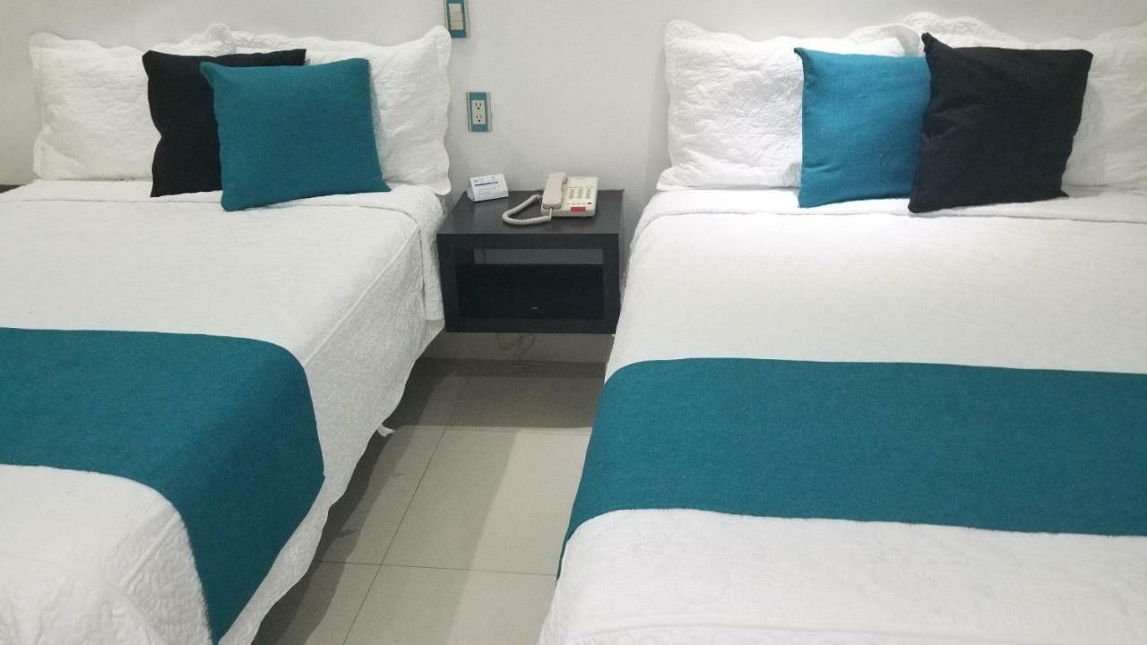 Hotel Dluxe ซานฮวน เด ลอสลากอส ภายนอก รูปภาพ