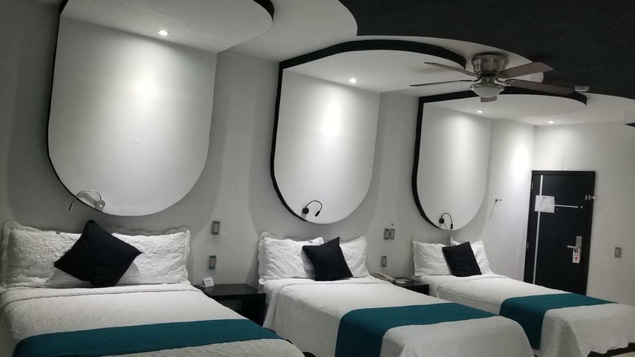 Hotel Dluxe ซานฮวน เด ลอสลากอส ภายนอก รูปภาพ