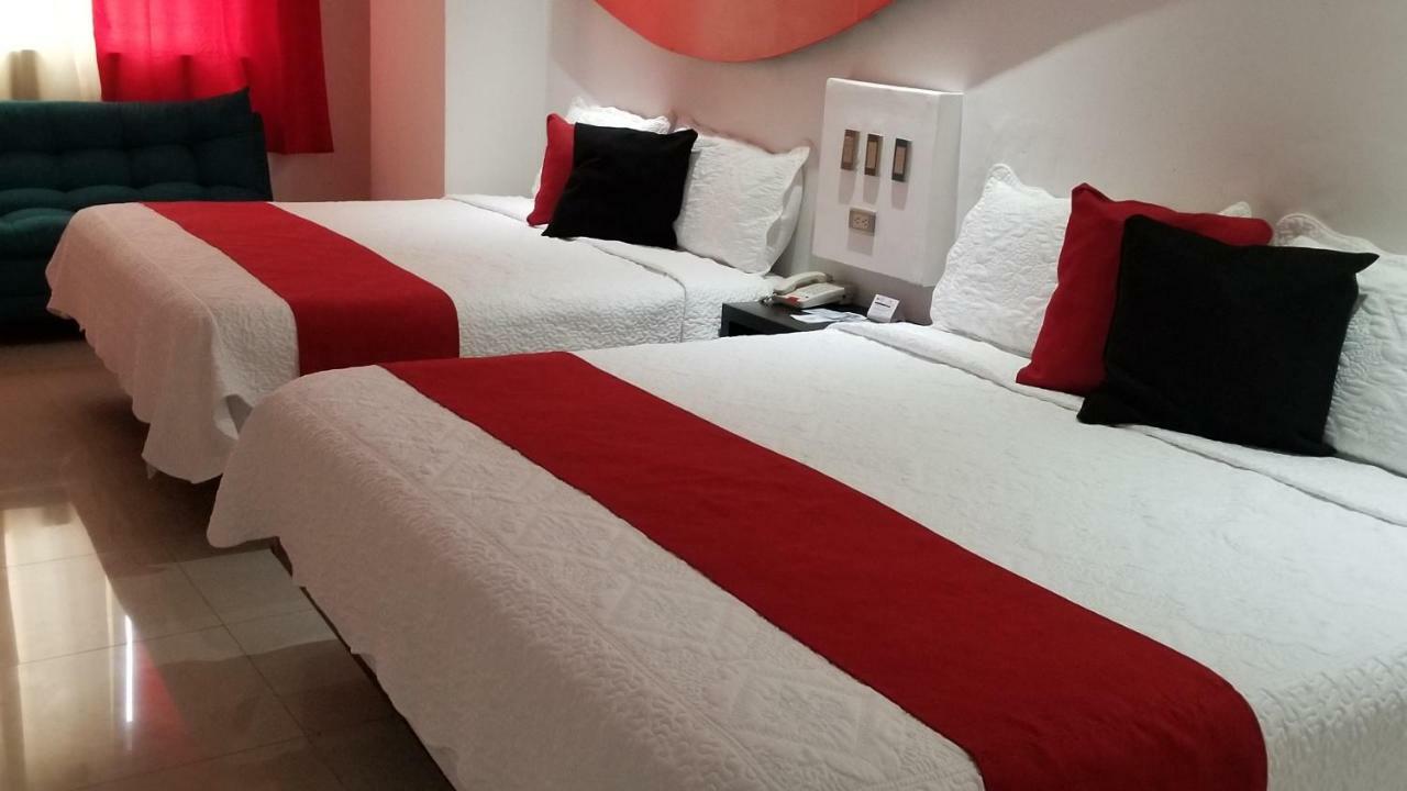 Hotel Dluxe ซานฮวน เด ลอสลากอส ภายนอก รูปภาพ
