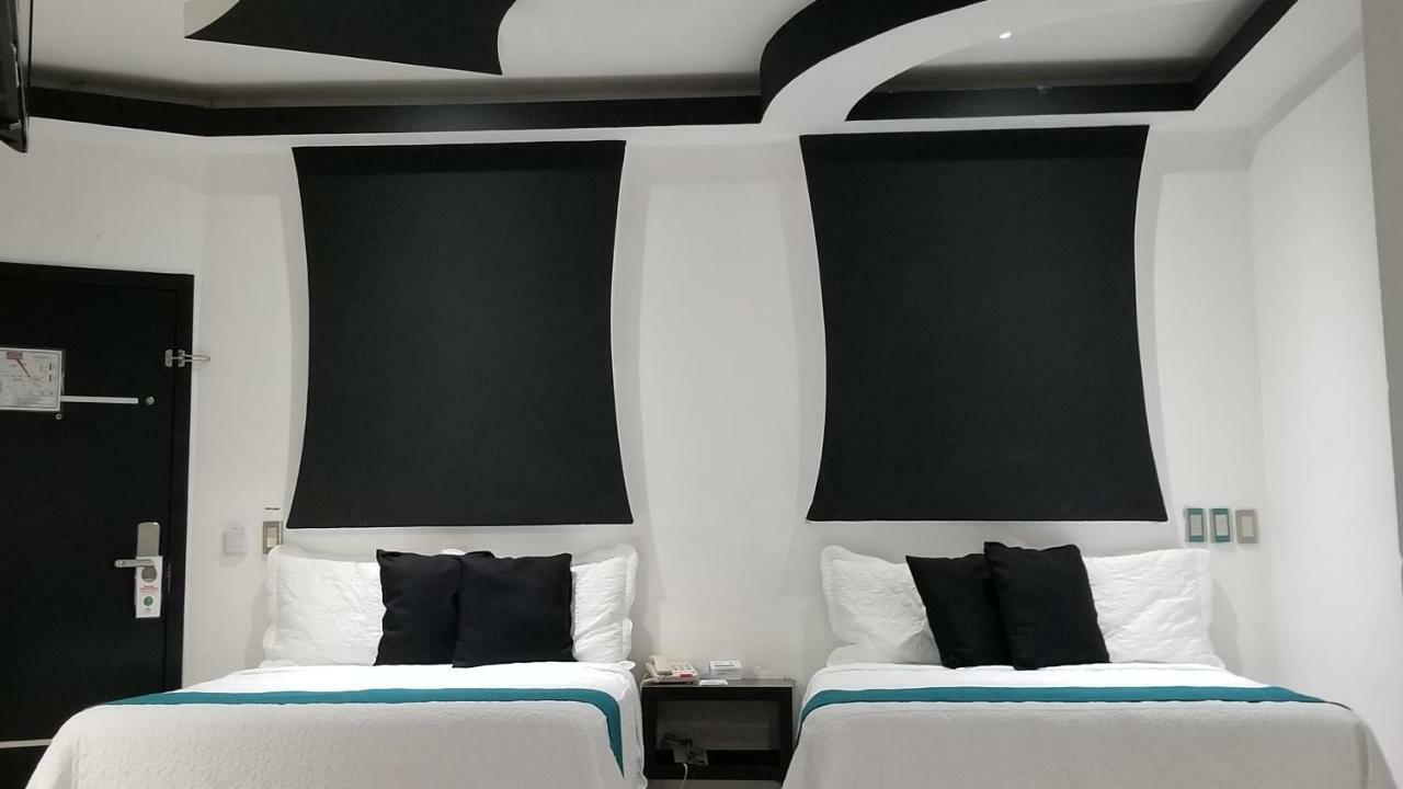 Hotel Dluxe ซานฮวน เด ลอสลากอส ภายนอก รูปภาพ