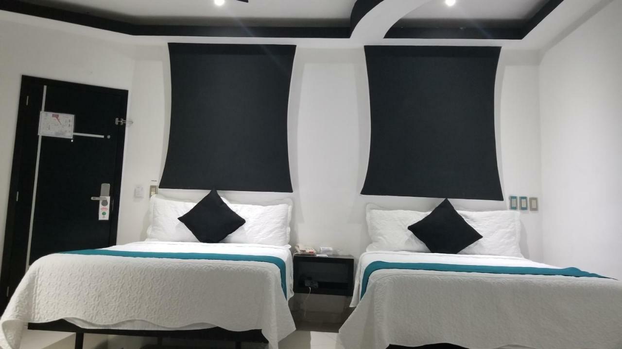 Hotel Dluxe ซานฮวน เด ลอสลากอส ภายนอก รูปภาพ