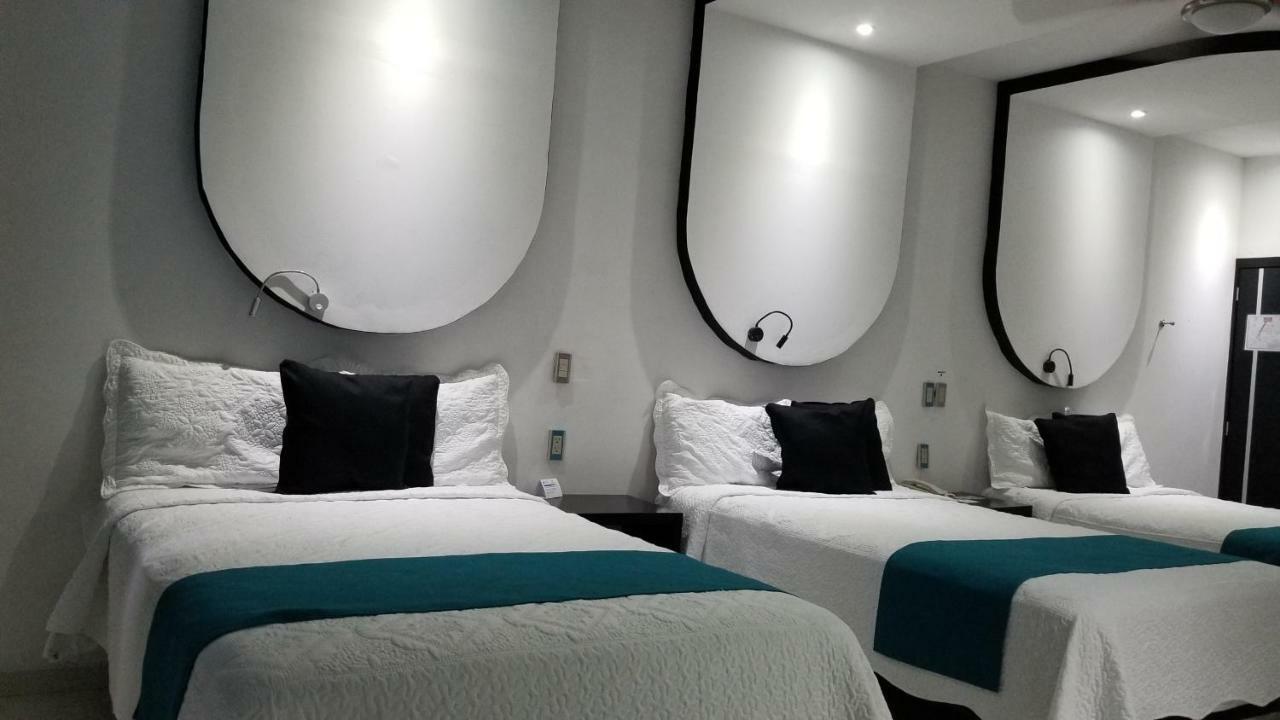 Hotel Dluxe ซานฮวน เด ลอสลากอส ภายนอก รูปภาพ