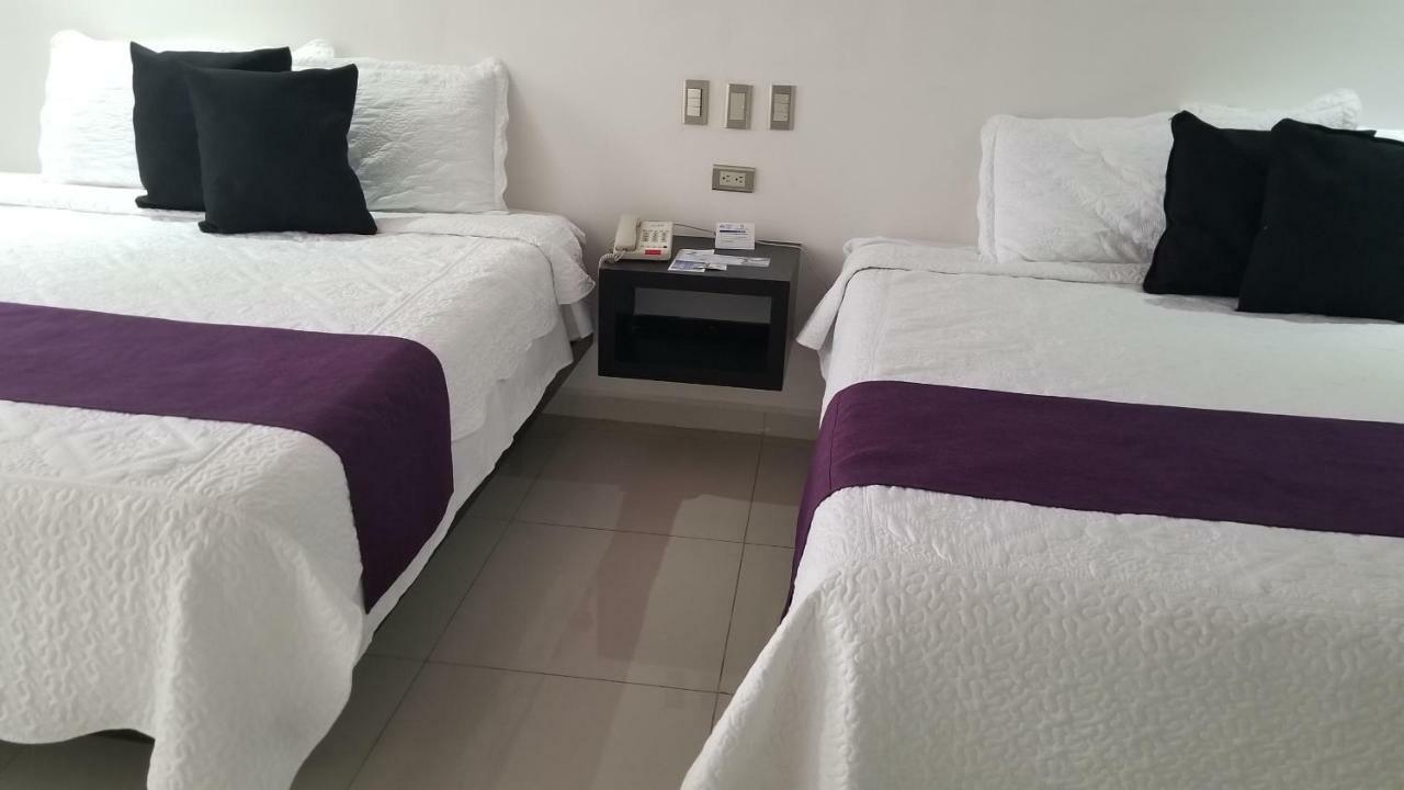 Hotel Dluxe ซานฮวน เด ลอสลากอส ภายนอก รูปภาพ
