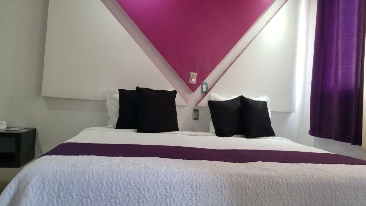 Hotel Dluxe ซานฮวน เด ลอสลากอส ภายนอก รูปภาพ
